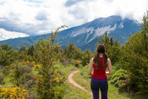 Hiker contemplating the environment around the Nature Trail through La Hoya de Huesca, Aragon