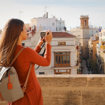 Tourist taking a photo of Valencia